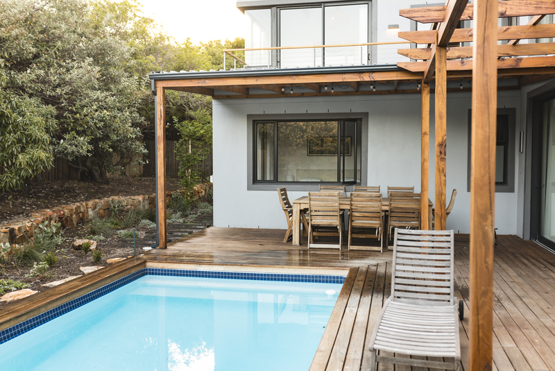 Fachada de casa en venta en Puebla ubicada en zona residencial con excelente iluminación natural.